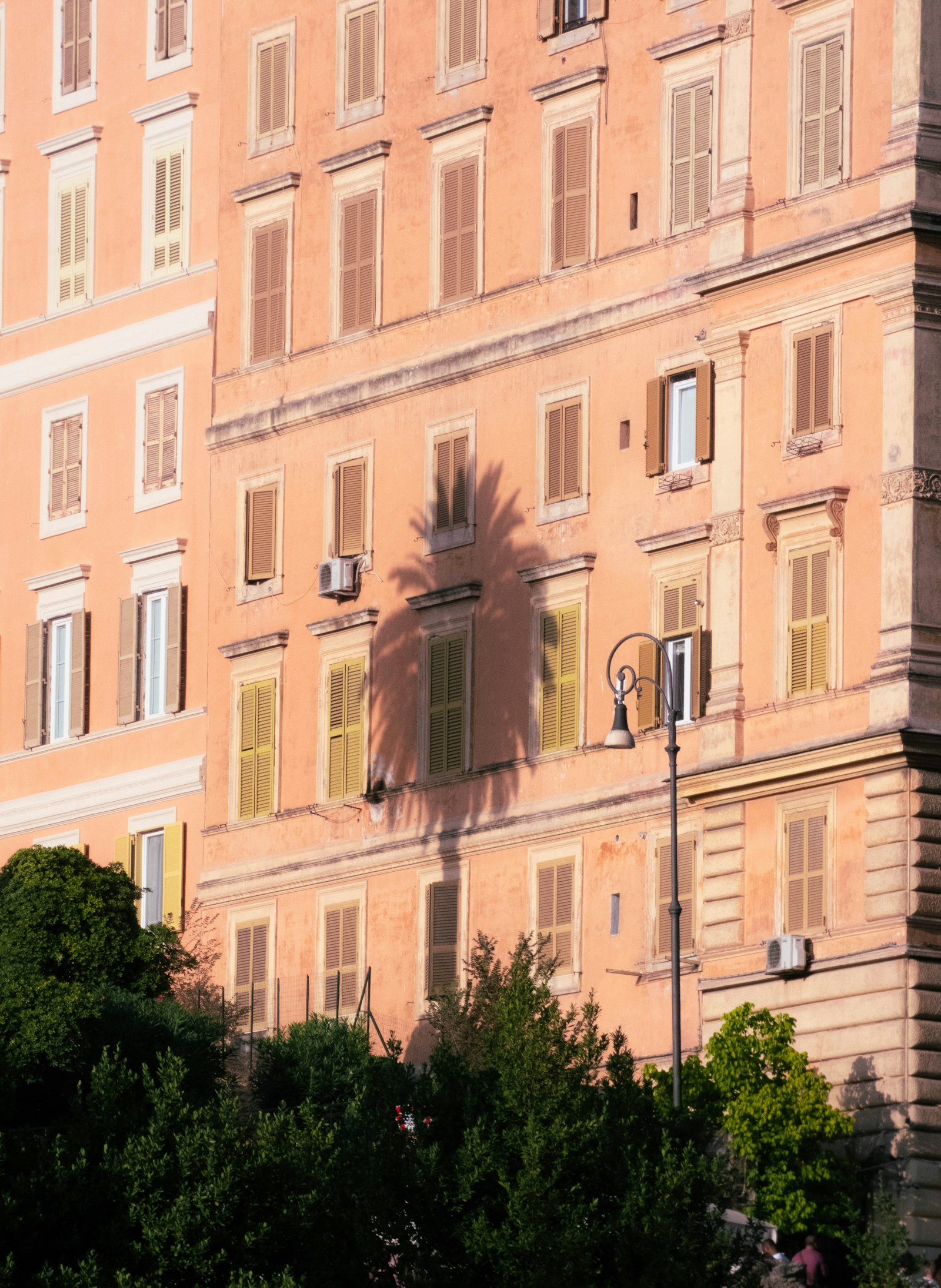 Italian residential building lit by warm afternoon sunlight